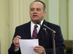 FILE - In this May 4, 2017 file photo, Assemblyman Raul Bocanegra, D-Pacoima, speaks at the Capitol in Sacramento, Calif.   Investigators say Bocanegra harassed several women while serving as an Assembly staff member about a decade ago, including by putting a subordinate's bracelet down his pants and asking her to retrieve it and repeatedly asking another employee on dates. He resigned in late 2017 and is a Democrat. The California Legislature says it racked up more than $1.8 million in legal costs from sexual harassment investigations during 2018 and the first month of 2019.