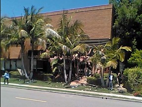 FILE - This May 15, 2018, file image taken from cellphone video shows a building after a fatal explosion in Aliso Viejo, Calif. Stephen Beal, who was released in 2018 after his arrest on an explosives charge, was arrested Sunday, March 3, 2019, in connection with the May 15 bombing that killed Ildiko Krajnyak in her Orange County spa, said FBI spokeswoman Laura Eimiller.