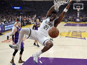 Milwaukee Bucks guard Tony Snell dunks during the first half of the team's NBA basketball game against the Los Angeles Lakers on Friday, March 1, 2019, in Los Angeles.