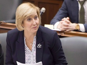 Ontario Labour Minister Laurie Scott introduces back-to-work legislation in the Ontario Legislature in Toronto on Monday, December 17, 2018. Ontario is gathering feedback on legislation aimed at eliminating the gender wage gap, including asking businesses how onerous pay transparency reporting would be.