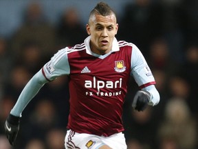 FILE - In this Saturday, Nov. 30, 2013 file photo, West Ham United's Ravel Morrison in action against Fulham during their English Premier League soccer match in London. Ravel Morrison is going to great lengths to revive his soccer career that started at Manchester United before he was sold following concerns over his attitude and he is scheduled to make his debut for Ostersund in Sweden upcoming Sunday March 31, 2019.