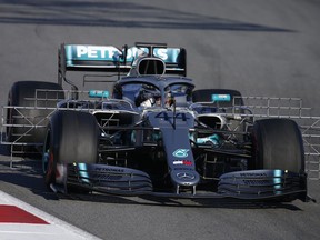 FILE - In this file photo dated Tuesday, Feb. 26, 2019, Mercedes driver Lewis Hamilton of Britain steers his car during a Formula One pre-season testing session at the Catalunya racetrack in Montmelo, outside Barcelona, Spain.  Previewing the upcoming 2019 season, last season was arguably Hamilton's best to date but he is ready to launch his quest for the next Formula One world championship title.