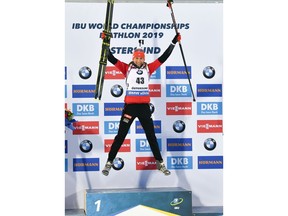 Anastasiya Kuzmina of Slovakia celebrates on the podium after winning the women's 7.5 km sprint event at the IBU World Biathlon Championships in Oestersund, Sweden, on Friday March 8, 2019.