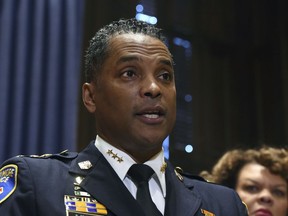 FILE - In this Jan. 19, 2018, file photo, Darryl DeSousa, a 30-year veteran of the Baltimore Police Department, takes questions at City Hall after replacing Kevin Davis as police commissioner, in Baltimore.  DeSousa, who resigned under pressure last year less than four months as the city's top cop was sentenced Friday, March 29, 2019 to 10 months in prison for a deliberate failure to file years of federal tax returns.