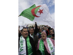 Demonstrators stage a protest to denounce President Abdelaziz Bouteflika's bid for a fifth term, in Marseille, southern France, Sunday, March 3, 2019. Algeria's Constitutional Council has been placed under high security as President Abdelaziz Bouteflika's bid for a fifth term is due to be formally submitted.