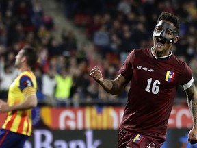 Venezuela's Roberto Rosales celebrates after scoring during a friendly soccer match between Catalonia and Venezuela at the Montilivi stadium in Girona, Spain, Monday, March 25, 2019.