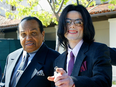 Michael Jackson with his father Joseph Jackson during the second week of Michael's child molestation trial in Santa Maria, California, March 8, 2005.
