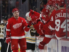 Detroit Red Wings right wing Anthony Mantha greets teammates after scoring during the first period of an NHL hockey game against the Boston Bruins, Sunday, March 31, 2019, in Detroit.