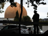 An armed policeman stands guard in front of the Masjid Al Noor Mosque in Christchurch on March 16, 2019.