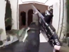 This image from a self-shot video that was streamed on Facebook on March 15, 2019 by the man who was involved in two mosque shootings in Christchurch shows him holding a gun as he enters the Masjid al Noor mosque.