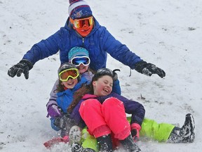 Kids are having a good time while sledding together on Sunday, March 3, 2019, at Kirkwood Park in Kirkwood, Mo. They are from the front: Nora Quindry, 10; Ellie Gruninger, 10; Hannah Nepple, 10; and Owen Gruninger, 12. All are from Kirkwood.