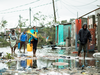 People return to Praia Nova Village, one of the most affected neighbourhoods following a cyclone in the coastal city of Beira, Mozambique, March 17, 2019.