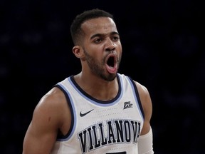 Villanova guard Phil Booth reacts after a basket against Seton Hall during the first half of an NCAA college basketball game in the championship of the Big East Conference tournament, Saturday, March 16, 2019, in New York.