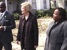 From left, Greenville, Miss. Mayor Errick Simmons, 2020 Democratic presidential candidate Sen. Elizabeth Warren and Mable Starks, former CEO Mississippi Action for Community Education, tour Central Avenue from Poplar Street in Greenville, Miss., Monday  March 18, 2019. The group discussed dilapidated and affordable housing in the rural communities.