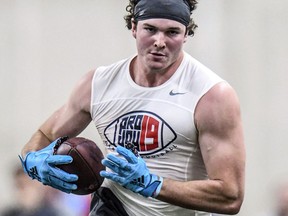 Tight end Dawson Knox runs upfield after catching a pass during Mississippi's Pro Day at the Manning Center in Oxford, Miss., Friday, March 29, 2019.