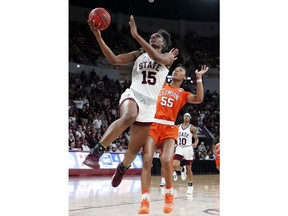 Mississippi State center Teaira McCowan (15) shoots a layup past Clemson forward Tylar Bennett (55) during the first half of a second-round women's college basketball game in the NCAA Tournament in Starkville, Miss., Sunday, March 24, 2019.