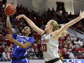 Kentucky's Tatyana Wyatt drives to the basket while North Carolina State's Elissa Cunane (33) defends during the first half of a second round women's college basketball game in the NCAA Tournament in Raleigh, N.C., Monday, March 25, 2019.