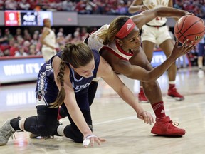 Maine's Fanny Wadling, left, and North Carolina State's Kiara Leslie chase the ball during the first half of a first round women's college basketball game in the NCAA Tournament in Raleigh, N.C., Saturday, March 23, 2019.