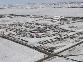 FILE - In this Feb. 13, 2017 file photo shows the town of Cannon Ball, N.D., on the Standing Rock Sioux Indian Reservation. The Native American tribe leading the fight against the Dakota Access oil pipeline said Thursday, Feb. 28, 2019, an Army Corps of Engineers document shows the agency concluded the pipeline wouldn't unfairly affect tribes before it consulted them. The Standing Rock Sioux officials say the document bolsters the tribe's claim that the Corps disregarded a federal judge's order to seriously review the pipeline's potential impact on the Standing Rock Sioux and three other Dakotas-based tribes and to not treat the study as a "bureaucratic formality."