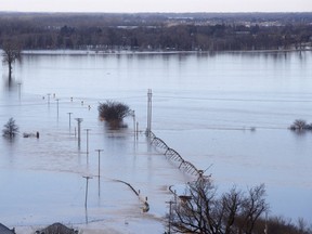 Looking southwest towards Waterloo Neb., high waters from the Elkhorn river cover Maple street in the distance Saturday March 16, 2019.  The flooding followed days of snow and rain -- record-setting, in some places -- that swept through the West and Midwest.