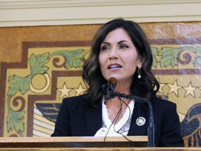 FILE - In this Jan. 2019 file photo, South Dakota Gov. Kristi Noem gives her first State of the State address in Pierre, S.D. South Dakota Gov. Kristi Noem on Wednesday, March 20, 2019 signed a package of bills aimed at curbing abortion. Noem said the bills will "crack down on abortion providers in South Dakota" by requiring providers to use a state form women must sign before they can end a pregnancy.