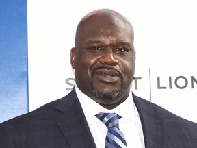 FILE - In this June 26, 2018 file photo, Shaquille O'Neal attends the world premiere of "Uncle Drew" at Alice Tully Hall in New York. Papa John's has a new pitchman: Shaquille O'Neal. The chain says the basketball Hall of Famer will appear on TV commercials and other advertisements. He will also join the company's board of directors and invest in nine of its restaurants.