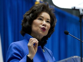 FILE - In this Dec. 11, 2018 file photo, Transportation Secretary Elaine Chao speaks during a major infrastructure investment announcement at transportation headquarters in Washington. The Transportation Department confirmed that its watchdog agency will examine how the FAA certified the Boeing 737 Max 8 aircraft, the now-grounded plane involved in two fatal accidents within five months. Transportation Secretary Elaine Chao formally requested the audit in a letter to Inspector General Calvin Scovel III. Chao, whose agency oversees the FAA, said the audit will improve the department's decision-making. Her letter confirmed that she had previously requested an audit but did not mention reports that the inspector general and federal prosecutors are looking into the development and regulatory approval of the jet.