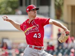FILE - In this March 13, 2019, file photo, St. Louis Cardinals starter Dakota Hudson (43) delivers a pitch in the first inning during an exhibition spring training baseball game against the Miami Marlins, in Jupiter, Fla. The 6-foot-5 right-hander could be a bigger part of the Cardinals' pitching plans after a strong spring that includes a 1.72 ERA and 17 strikeouts over 15 2/3 innings.