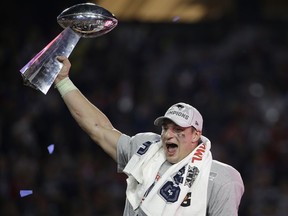 FILE - In this Feb. 1, 2015, file photo, New England Patriots tight end Rob Gronkowski celebrates after the Patriots defeated the Seattle Seahawks in the NFL Super Bowl football game in Glendale, Ariz. Gronkowski says he is retiring from the NFL after nine seasons. Gronkowski announced his decision via a post on Instagram Sunday, March 24, 2019, saying that a few months shy of this 30th birthday "its time to move forward and move forward with a big smile."