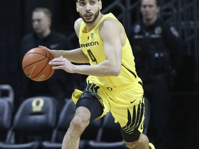 FILE - In this Feb. 28, 2019, file photo, Oregon's Ehab Amin brings the ball down court against Arizona State during an NCAA college basketball game, in Eugene, Ore. Ehab Amin is doing his best to make the Egyptian's lone season at Oregon memorable. The senior who transferred after graduating from Texas A&M Corpus Christi has helped the Ducks reach the Sweet 16 with his energy both on and off the bench disrupting opponents.