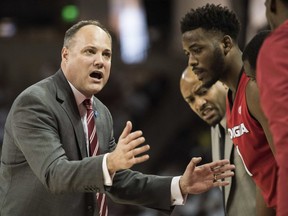 FILE - In this Saturday, Feb. 4, 2017 file photo, Georgia head coach Mark Fox communicates with players during the first half of an NCAA college basketball game against South Carolina in Columbia, S.C. California has hired Mark Fox as its new men's basketball coach. A person familiar with the hiring said on Friday, March, 29, 2019 that Fox got the job five days after Wyking Jones was fired. The person spoke on condition of anonymity because the school had not made a formal announcement. Stadium first reported that Fox would get the job.