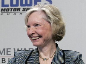 FILE - In this May 9, 2006, file photo, Janet Guthrie smiles during a press conference at Lowe's Motor Speedway in Concord, N.C. Guthrie, the first woman to qualify and compete in both the Daytona 500 and the Indianapolis 500, was dropped from the list of nominees for NASCAR's Landmark Award that honors contribution to the sport.