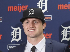 FILE - In this June 25, 2018, file photo, Detroit Tigers first overall pick Casey Mize is seen during a news conference where he was introduced to the media, in Detroit. The Detroit Tigers have assigned top draft pick Casey Mize to minor league camp. The No. 1 selection in last year's draft pitched two innings for the Tigers against St. Louis. Manager Ron Gardenhire says that as starters begin throwing more innings in spring training, it's harder to find room for other pitchers to get in the game. Mize will go to minor league camp so he can pitch more.