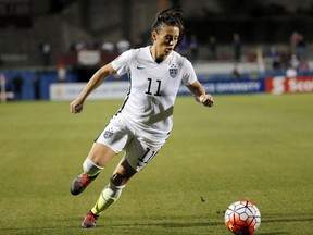 FILE - In this Feb. 10, 2016, file photo, United States defender Ali Krieger (11) controls the ball during a CONCACAF Olympic qualifying tournament soccer match against Costa Rica in Frisco, Texas. Krieger was named to the U.S. women's national team roster Thursday, March 21, 2019, for exhibition matches against Australia and Belgium as the team prepares for the World Cup in France starting in June.