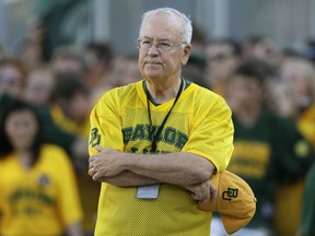 FILE - In the Sept. 12, 2015, file photo, Baylor President Ken Starr waits to run onto the field before an NCAA college football game in Waco, Texas.  Starr told the Waco Tribune-Herald that he hosted a fundraiser at his home for the legal defense fund of Shawn Oakman, a former star defensive end for the Bears who was acquitted of rape last month.. Starr was fired as Baylor's president in 2016, after an outside investigation determined there was a "fundamental failure" in the way the school responded to sexual assault allegations.