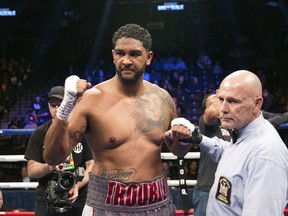 FILE - In this Nov. 4, 2017, file photo, Dominic Breazeale celebrates after defeating Eric Molina in a heavyweight boxing match in New York. Wilder is slated to defend his title May 18, 2019, at Barclays Center in New York, against mandatory challenger Dominic Breazeale.
