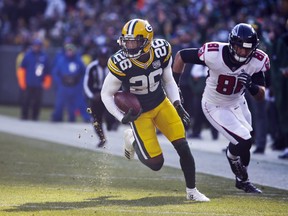 FILE - In this Dec. 9, 2018, file photo, Green Bay Packers' Bashaud Breeland returns an interception for a touchdown during the first half of an NFL football game against the Atlanta Falcons in Green Bay, Wis. The Kansas City Chiefs have signed Breeland to a $2 million contract on Tuesday, March 19, 2019, for the upcoming season that could be worth an additional $3 million if incentives are met.