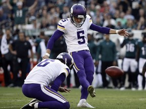 FILE - In this Oct. 7, 2018, file photo, Minnesota Vikings' Dan Bailey (5) kicks a field goal during the first half of an NFL football game against the Philadelphia Eagles in Philadelphia. The Vikings have agreed to terms on a new contract with Bailey, the ninth-year veteran who was signed last season to replace struggling rookie Daniel Carlson.