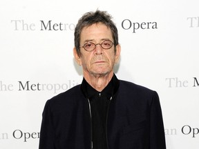 FILE - This March 24, 2011 file photo shows musician Lou Reed at the Metropolitan Opera's premiere of "Le Comte Ory" in New York. The New York Public Library has opened an archive dedicated to the pioneering alternative rock musician. The library acquired the archive after performance artist and musician Laurie Anderson, who was married to Reed, decided to share it with an institution that could preserve and showcase the archive.