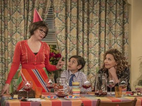 This image released by Netflix shows Rita Moreno, from left, Marcel Ruiz and Justina Machado in a scene from "One Day At A Time." Fans and Latino diversity advocates are lamenting the end of two well-known Latino-themed television shows, Netflix's "One Day at a Time" and CW's "Jane the Virgin." But other shows featuring U.S. Latino characters are trying to step in and capture the attention of fragmented audiences looking for diversity.