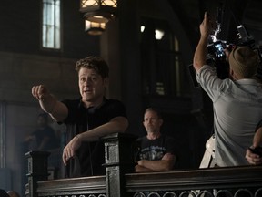 This image released by Fox shows actor-director Ben McKenzie directing the "13 Stitches" episode of his series "Gotham," which aired on Feb. 14. During the five years he's starred as Gotham City police detective and future commissioner James Gordon in the Batman prequel, McKenzie also wrote two episodes and directed three others. (Fox via AP)