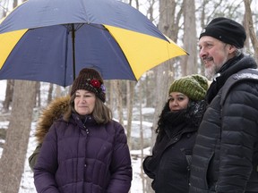 This undated image released by Cinetic Media shows filmmaker Kent Jones, right, with actress Mary Kay Place, left, and associate producer Gabi Madsen on the set of "Diane." The film is a modest and raw character study starring Place as a widower who  spends her guilt-ridden days visiting her addicted and overbearing son, a soup kitchen and her diminishing community of friends and family. (Cinetic Media via AP)