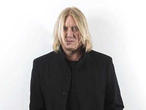FILE - In this Jan. 23, 2018 file photo, Def Leppard singer Joe Elliot appears during a photo shoot in New York.  Def Leppard will be inducted into the Rock & Roll Hall of Fame on Friday.