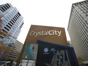 FILE - This Nov. 13, 2018, file photo shows a sign of a street map for Crystal City neighborhood of Arlington, Va. Protesters repeatedly shouted "shame" as a northern Virginia county board Saturday unanimously approved a $23 million incentives package for Amazon to build a new headquarters there.