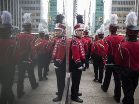 Members of a band line up before marching up Fifth Avenue during the St. Patrick's Day Parade, Saturday, March 16, 2019, in New York.