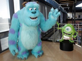 FILE - This Tuesday, Jan. 24, 2006 file photo shows characters from the movie "Monsters Inc." in the lobby of Pixar headquarters in Emeryville, Calif. On Friday, March 29, 2018, The Associated Press has found that stories circulating on the internet that Disney-Pixar are to release "Boo," a film spinoff from the animated "Monsters, Inc." franchise, in July 2020, are untrue.