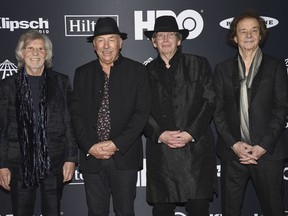 Rod Argent, from left, Hugh Grundy, Chris White and Colin Blunstone, of The Zombies, arrive at the Rock & Roll Hall of Fame induction ceremony at the Barclays Center on Friday, March 29, 2019, in New York.