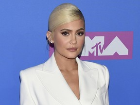 FILE - In this Monday, Aug. 20, 2018 file photo, Kylie Jenner arrives at the MTV Video Music Awards at Radio City Music Hall in New York. At 21, Jenner has been named the youngest-ever, self-made billionaire by Forbes magazine in March 2019.