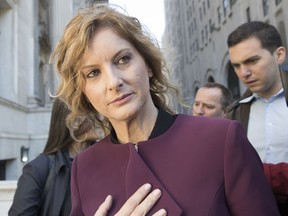 In this Oct. 18, 2018 file photo, Summer Zervos leaves New York state appellate court in New York. A New York appeals court has ruled that President Donald Trump isn't immune from a defamation lawsuit filed by the former "Apprentice" contestant who accused him of unwanted kissing and groping.