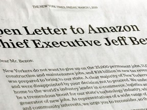This photo shows a portion of an open letter published in the Friday, March 1, 2019 edition of The New York Times, signed by a group of business leaders, elected officials and others, urging Amazon CEO Jeff Bezos to reconsider the decision to abandon building a headquarters in New York City. The deal would have had Seattle-based Amazon redevelop a site in the Long Island City section of the Queens borough of New York, for one of two new headquarters. The company expected to base 25,000 jobs there.